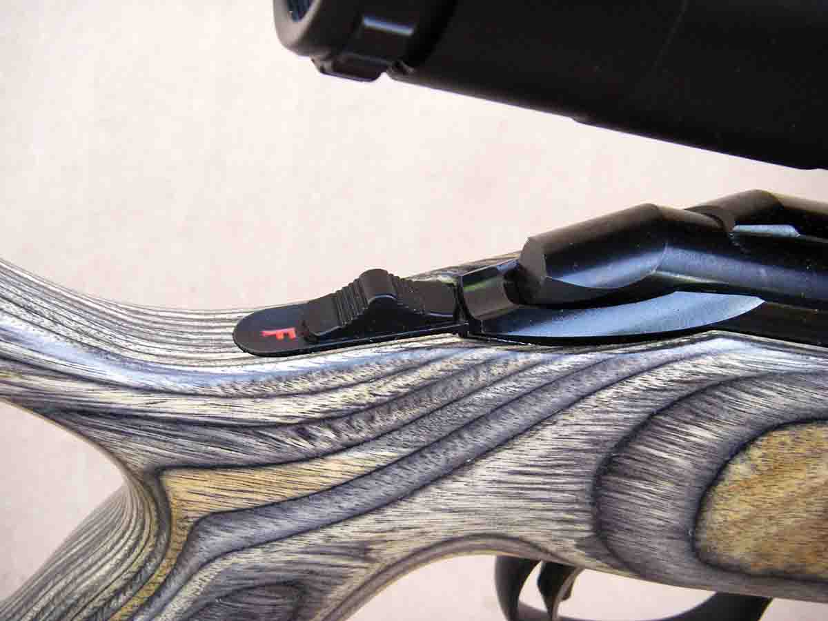 The American Rimfire features a tang-mounted safety